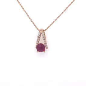 14k Rose gold, Ruby and diamond necklace.