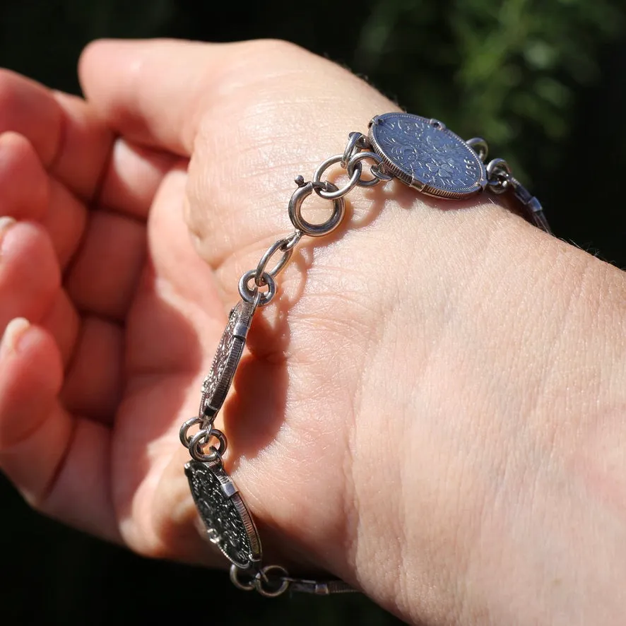 1960 - 1966 Sixpence Bracelet - set in 4 claw settings with double links, 20cm or 8 inches