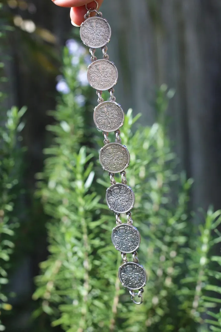 1960 - 1966 Sixpence Bracelet - set in 4 claw settings with double links, 20cm or 8 inches